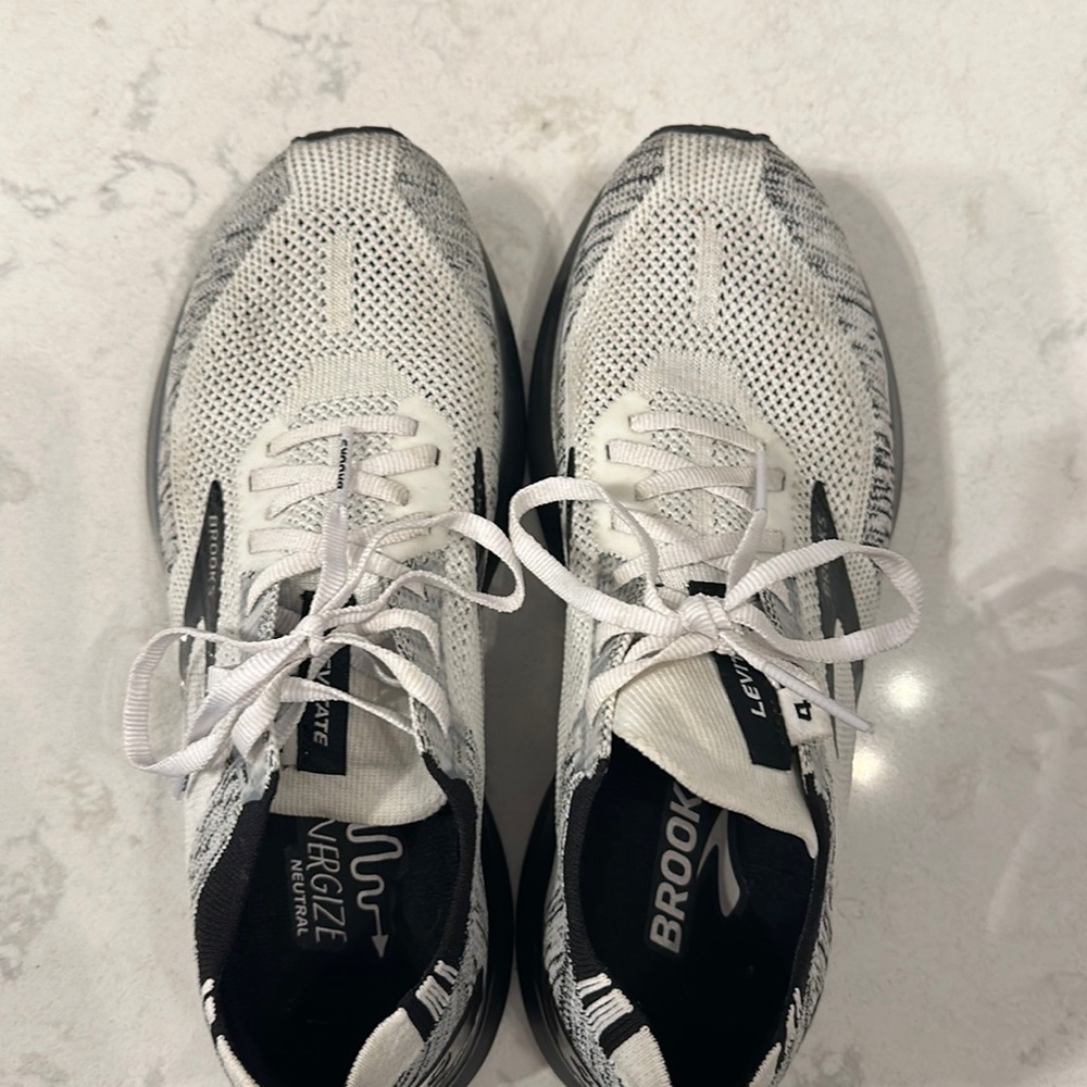 Brooks running shoes- only worn twice. Too small for my feet!